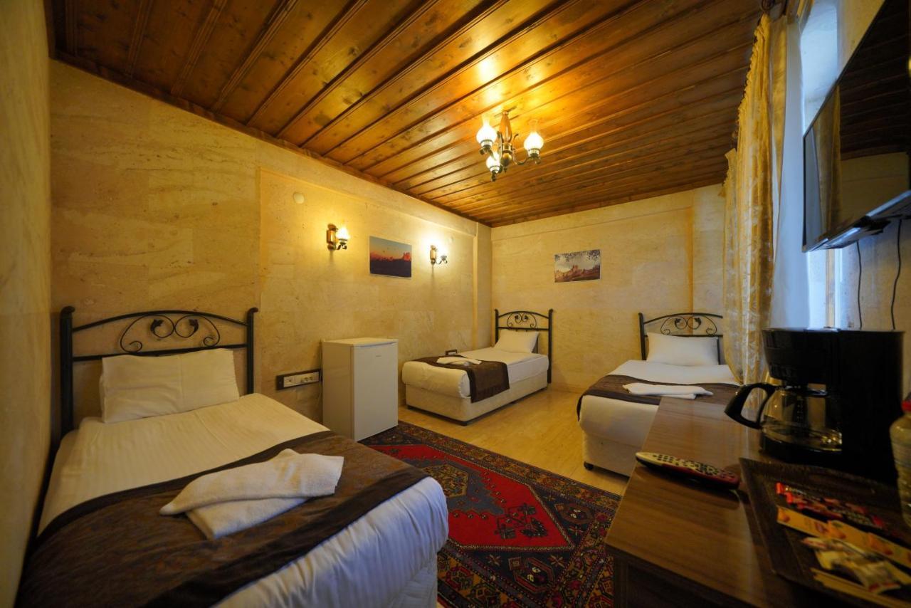 Cave Rooms&pool Гьореме